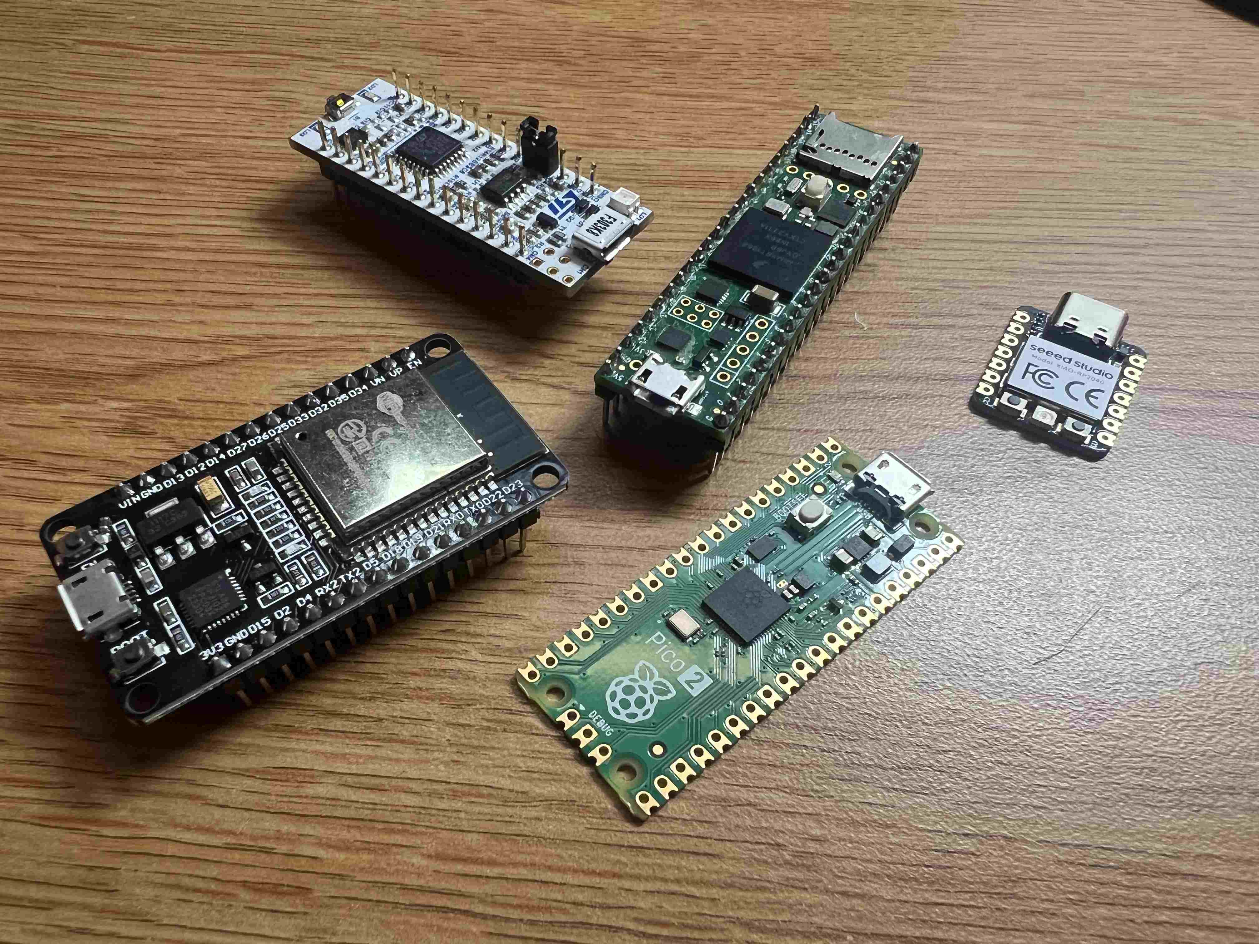 An ESP32, STM32 Nucleo, Teensy 4.1, Raspberry Pi Pico 2, Seeed Studio XIAO